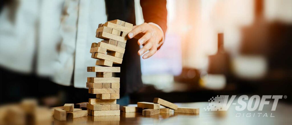 building blocks fall after professional fails AI project.